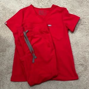 Figs women’s Catarina one pocket scrub top and Zamora jogger scrub pants.